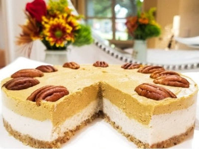 High-quality image of a keto-friendly pumpkin spice cheesecake The creamy filling is rich in pumpkin flavor and warm spices, making it a guilt-free and low-carb dessert option for a ketogenic diet.