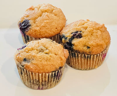 Paleo blueberry muffins: Homemade, grain-free muffins filled with ripe blueberries, almond flour, and a touch of honey, perfect for a healthy, gluten-free breakfast or snack."